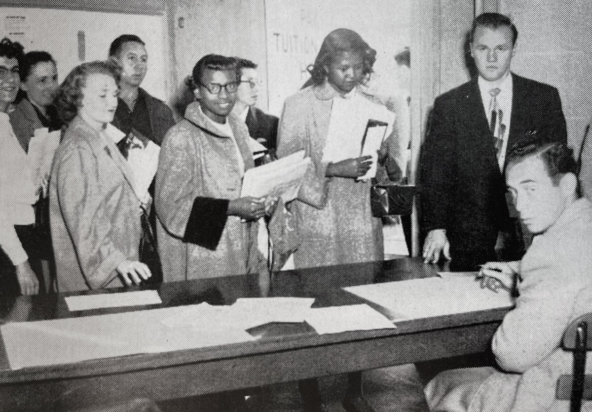 A photo of students registering for classes during the early years of LASC.