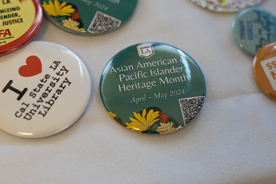 Buttons promoting many Cal State L.A. related organizations and events, including Asian American & Pacific Islander Heritage Month.